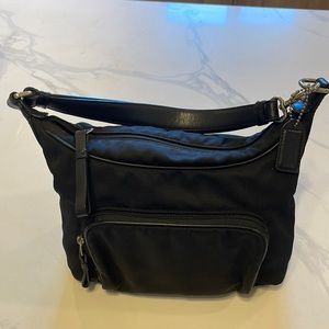 COACH black shoulder bag.